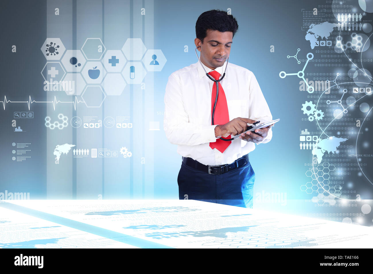 doctor at hospital using a digital tablet Stock Photo