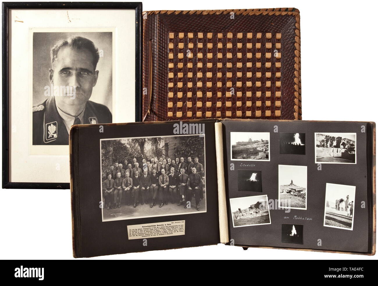 An estate of Rudolf Türke - member of NSDAP local group Cairo Two photo albums with 300 highly interesting images, including a mountain ascent, images of the national group leader (with a dedication to Türke), National Day of Mourning in Cairo, reception for the officers of the 'Karlsruhe', a Nile boat with swastika, German Day in Egypt, parade of flags, Gau meeting in Cairo, receptions, land and people. Among these is a portrait of Rudolf Heß with handwritten dedication (tr.) 'to my old comrade-in-arms Christmas 1939', and a further framed portrait of Heß. Highly interesti, Editorial-Use-Only Stock Photo
