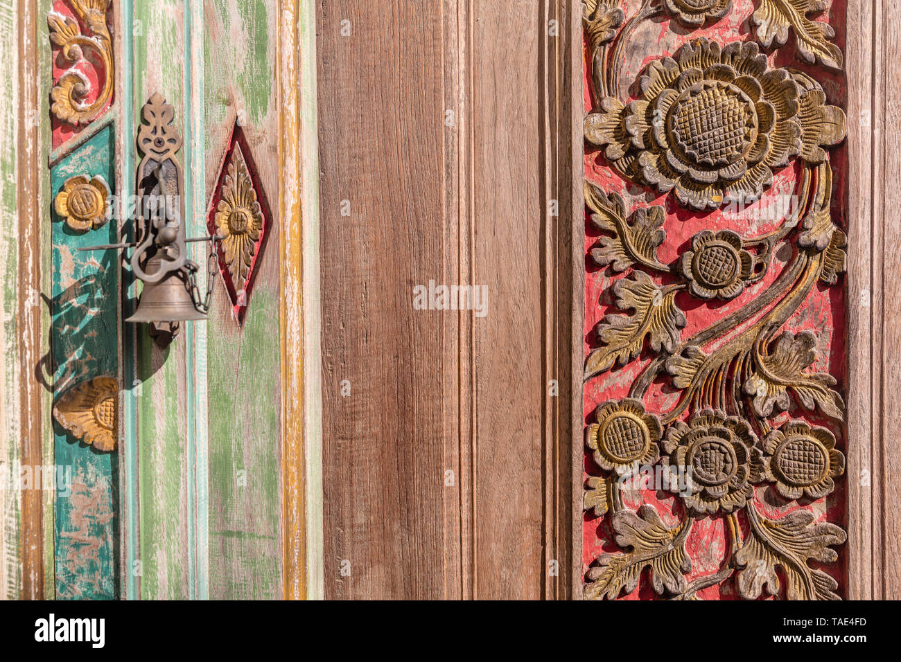 Carved wooden doors of Balinese house, Bali, Indonesia. With space. Stock Photo