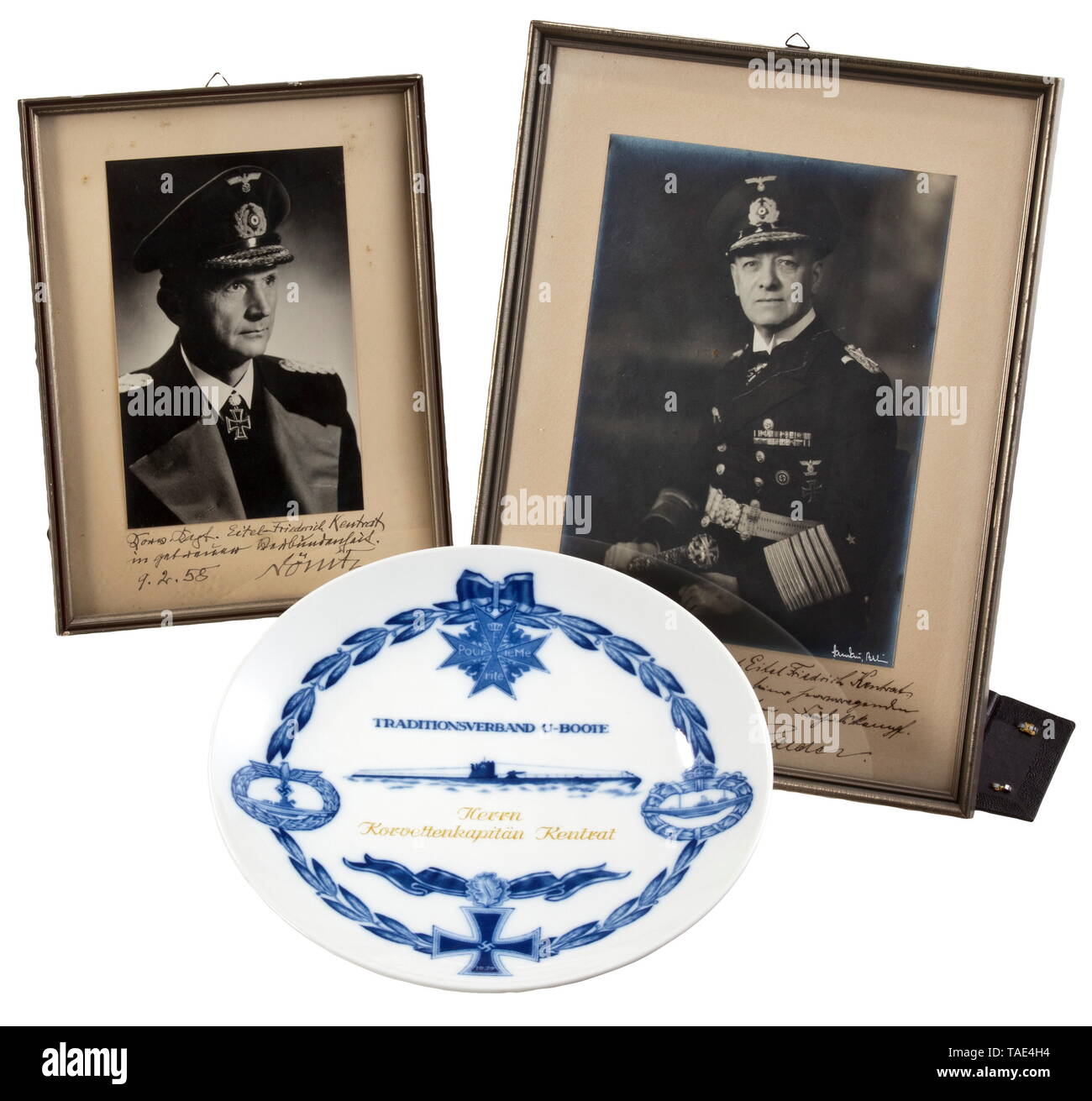 Knight's Cross bearer, corvette captain and commander of U-74 Eitel-Friedrich Kentrat - an honour plate of the U-Boat Force on the award of the Knight's Cross and an inscribed portrait from Erich Raeder White glazed porcelain plate manufactured by Meissen (sword mark), the blue décor depicting the awards of WWI and WWII submarine commanders on a laurel wreath and dedicated in yellow-gold to 'Herrn Korvettenkapitän Kentrat'. Reverse marked with 'N11Z' and the enrolment number '135'. Diameter 25.3 cm. Together with a presentation portrait with inscription by Großadmiral Raede, Editorial-Use-Only Stock Photo