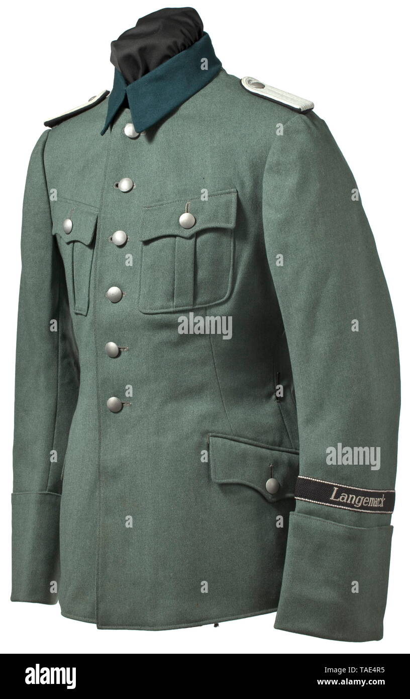 A field tunic for an SS-Untersturmführer of infantry in 27th SS Volunteer Grenadier Division 'Langemarck' (Flemish no. 1) Old style tunic in field-grey gabardine with dark-green collar, simulated cuffs and silver buttons. Brown cotton liner with belt carry loops, one belt hole as well as an opening for the sidearm. Slip-on matte shoulder boards with black liner and white service branch colour. Black cuff title in flatwire-like issue with woven cellon 'Langemarck' in Latin block letters, silver-grey edges. The 'Langemarck' division was established in October 1944 from the SS, Editorial-Use-Only Stock Photo