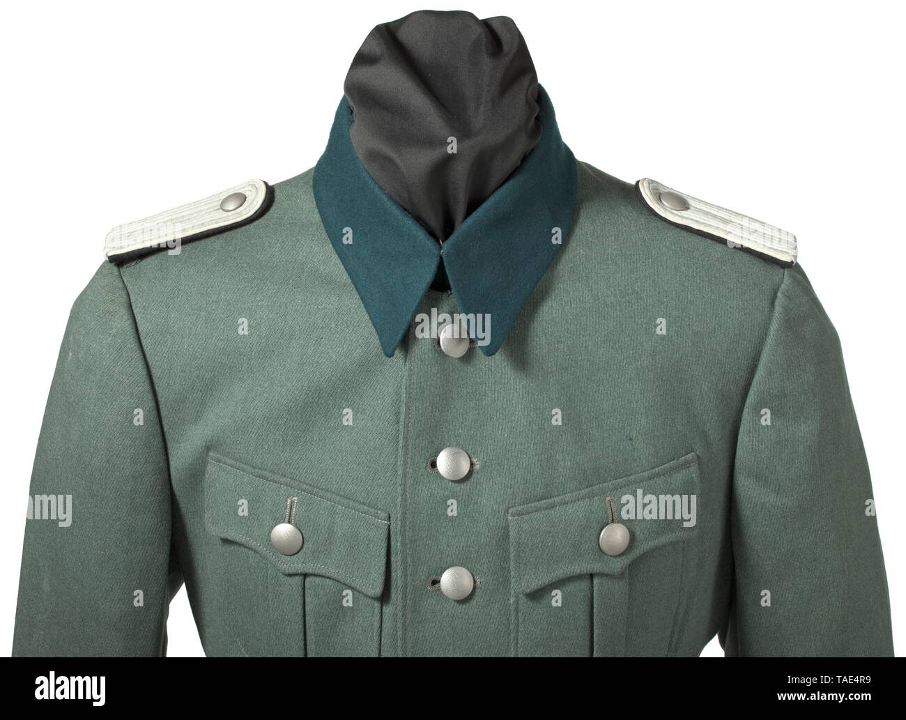 A field tunic for an SS-Untersturmführer of infantry in 27th SS Volunteer Grenadier Division 'Langemarck' (Flemish no. 1) Old style tunic in field-grey gabardine with dark-green collar, simulated cuffs and silver buttons. Brown cotton liner with belt carry loops, one belt hole as well as an opening for the sidearm. Slip-on matte shoulder boards with black liner and white service branch colour. Black cuff title in flatwire-like issue with woven cellon 'Langemarck' in Latin block letters, silver-grey edges. The 'Langemarck' division was established in October 1944 from the SS, Editorial-Use-Only Stock Photo