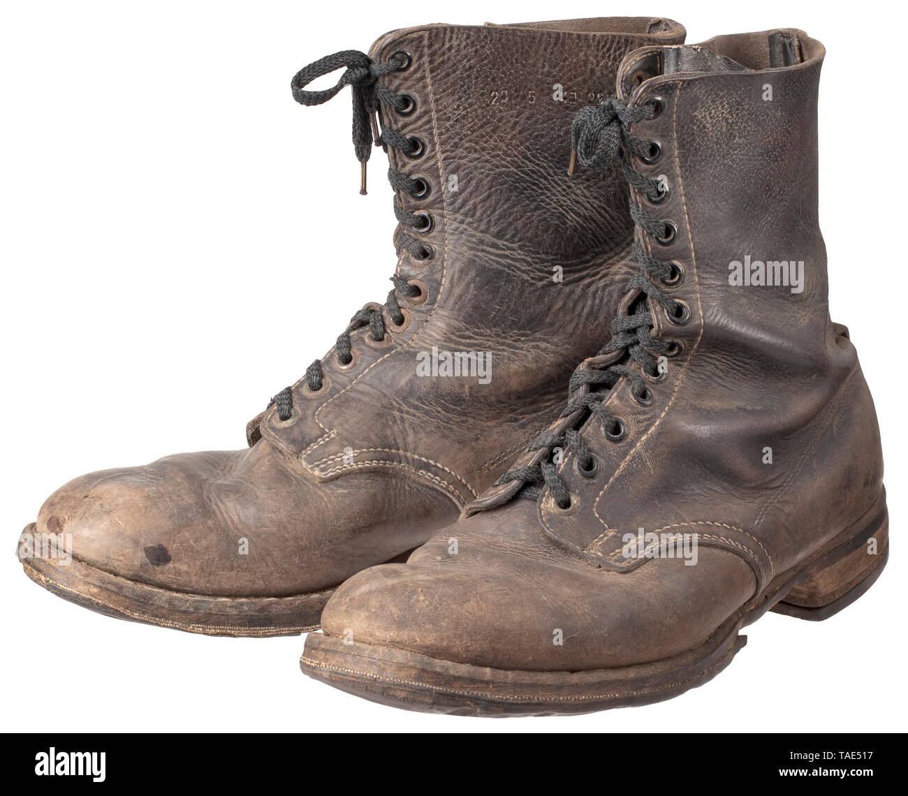 A pair of boots for paratroopers 2nd model with front lacing Smooth black  leather, the superimposed shafts with open lacing and twelve sets of black  painted eyelets. Welt-sewn rubber soles with pre-pierced