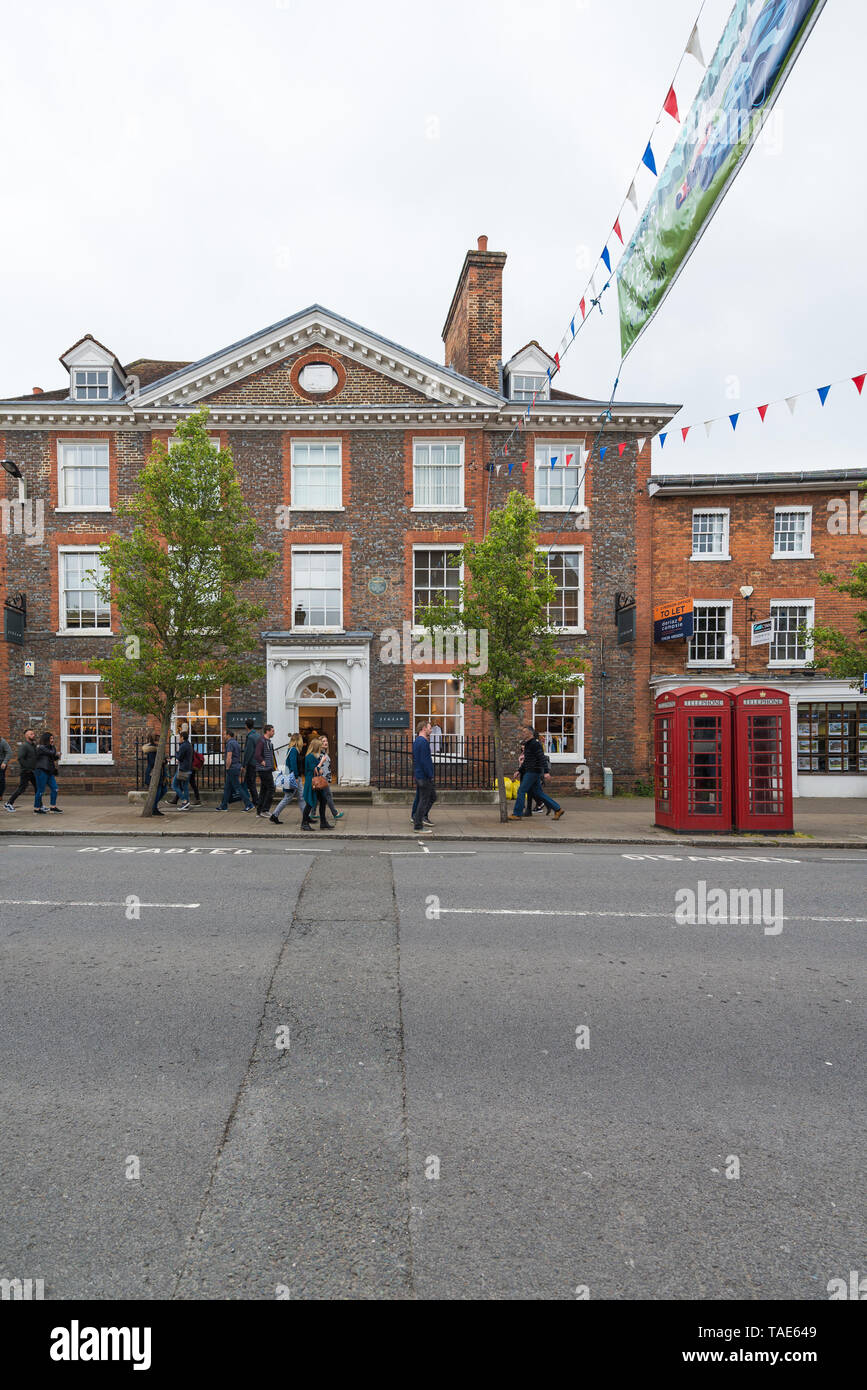 Saturday shoppers walk past the Jigsaw clothes shop in High Street
