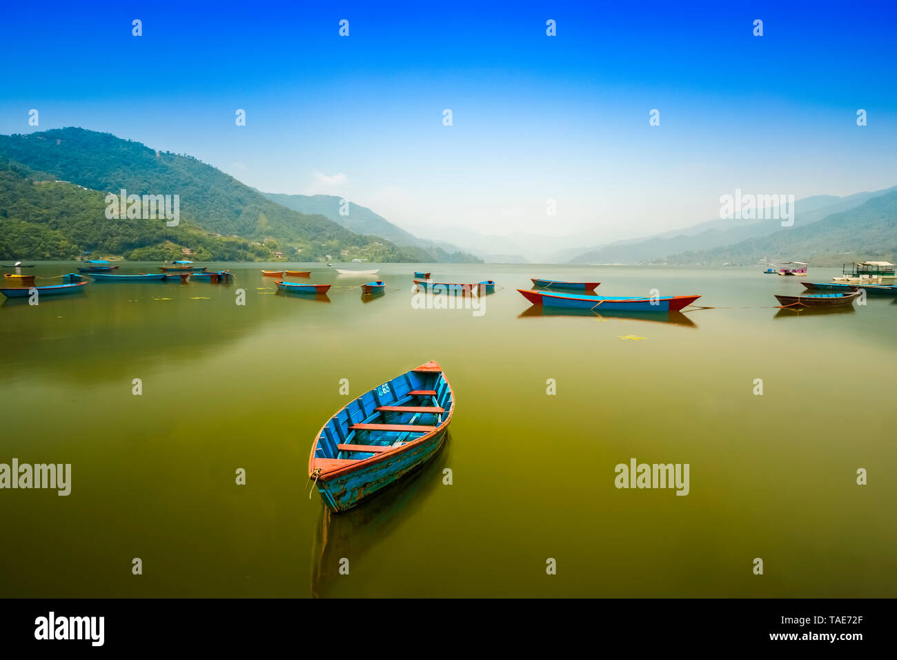Phewa Lake is Famous and Beautiful wooden Boats in Lake Pokhara Nepal Stock Photo