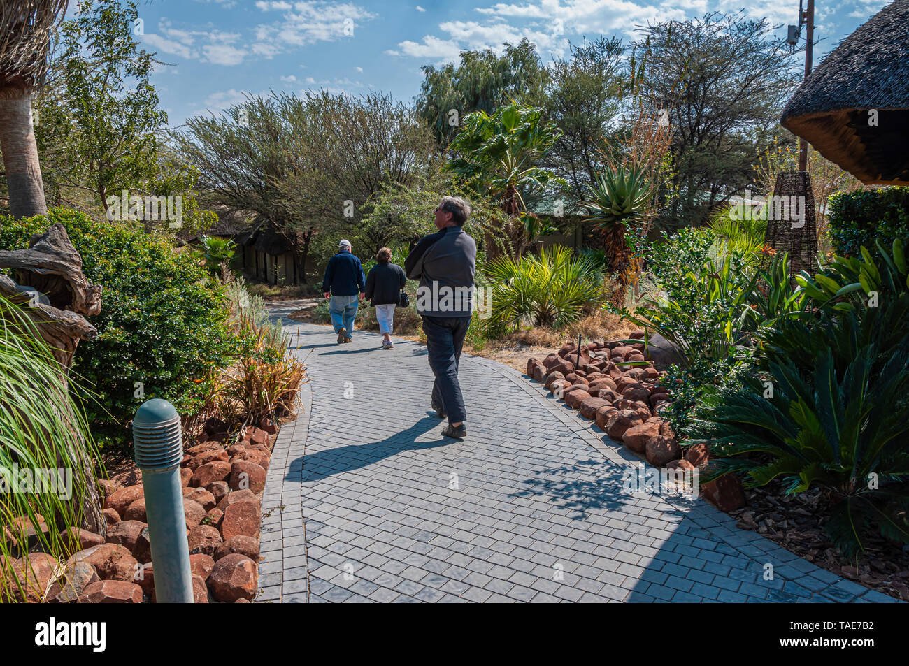 Guests walking from the restaurant at Erindi Private Game Reserve in ...