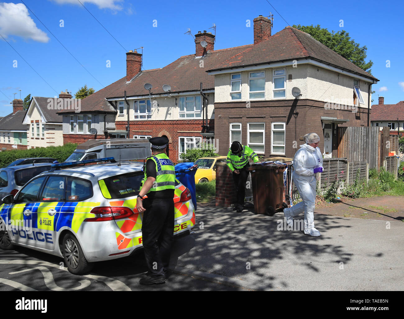 Police at a property on Gregg House Road in Shiregreen, Sheffield, after six children were taken
