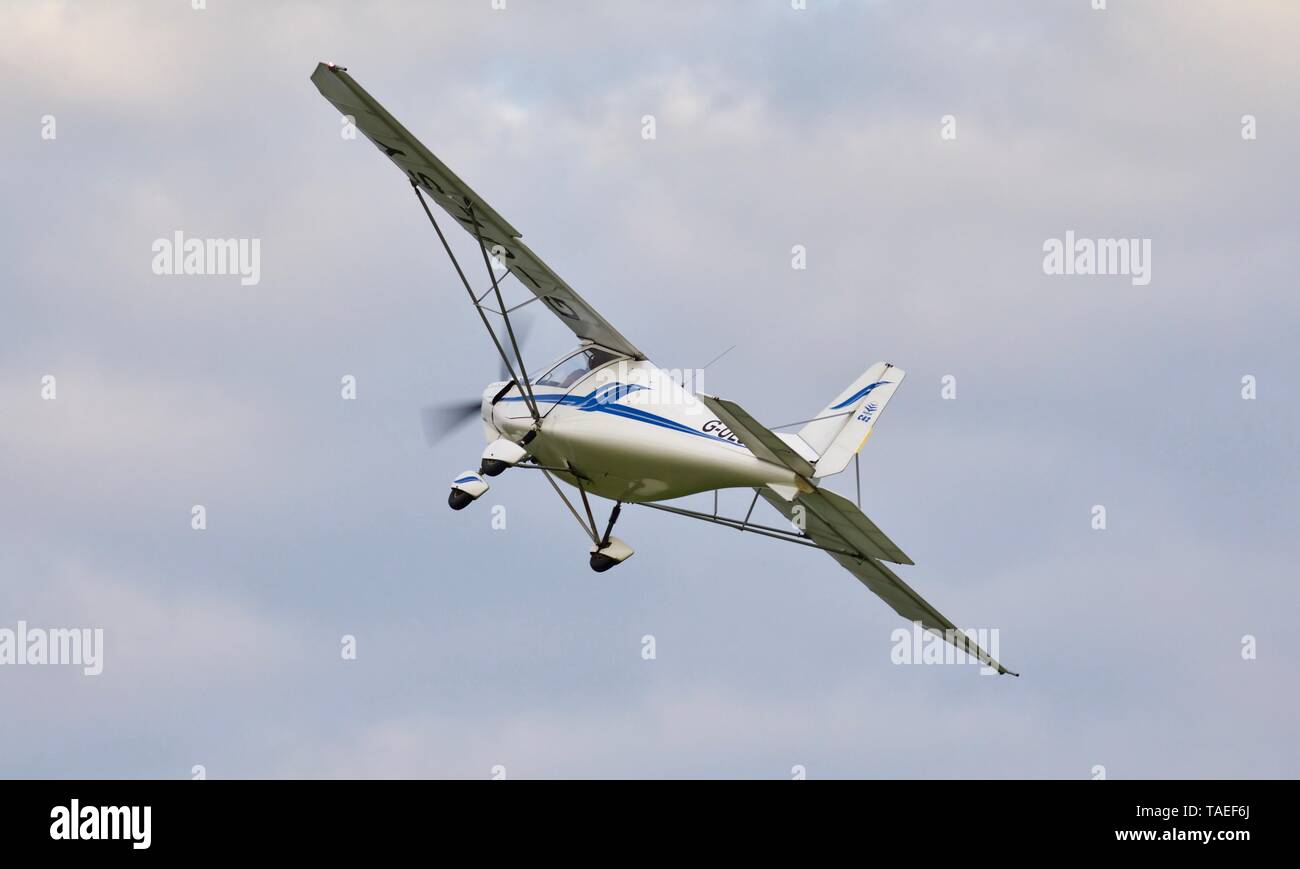 Ikarus C42 “G-ULSY” taking off from Old Warden Aerodrome on the 18th May 2019 Stock Photo