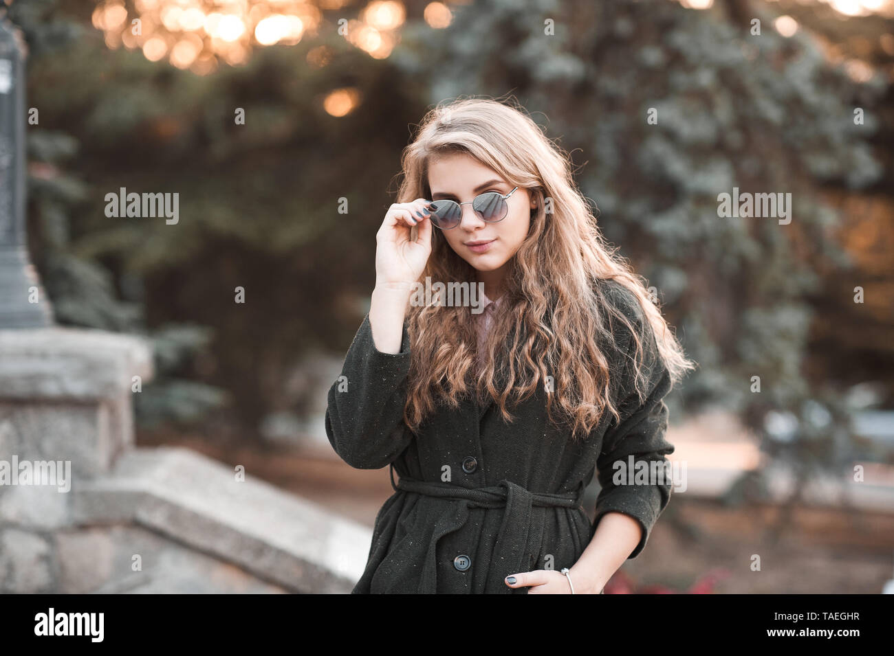 Blonde teenager girl glasses curly hi-res stock photography and images -  Alamy
