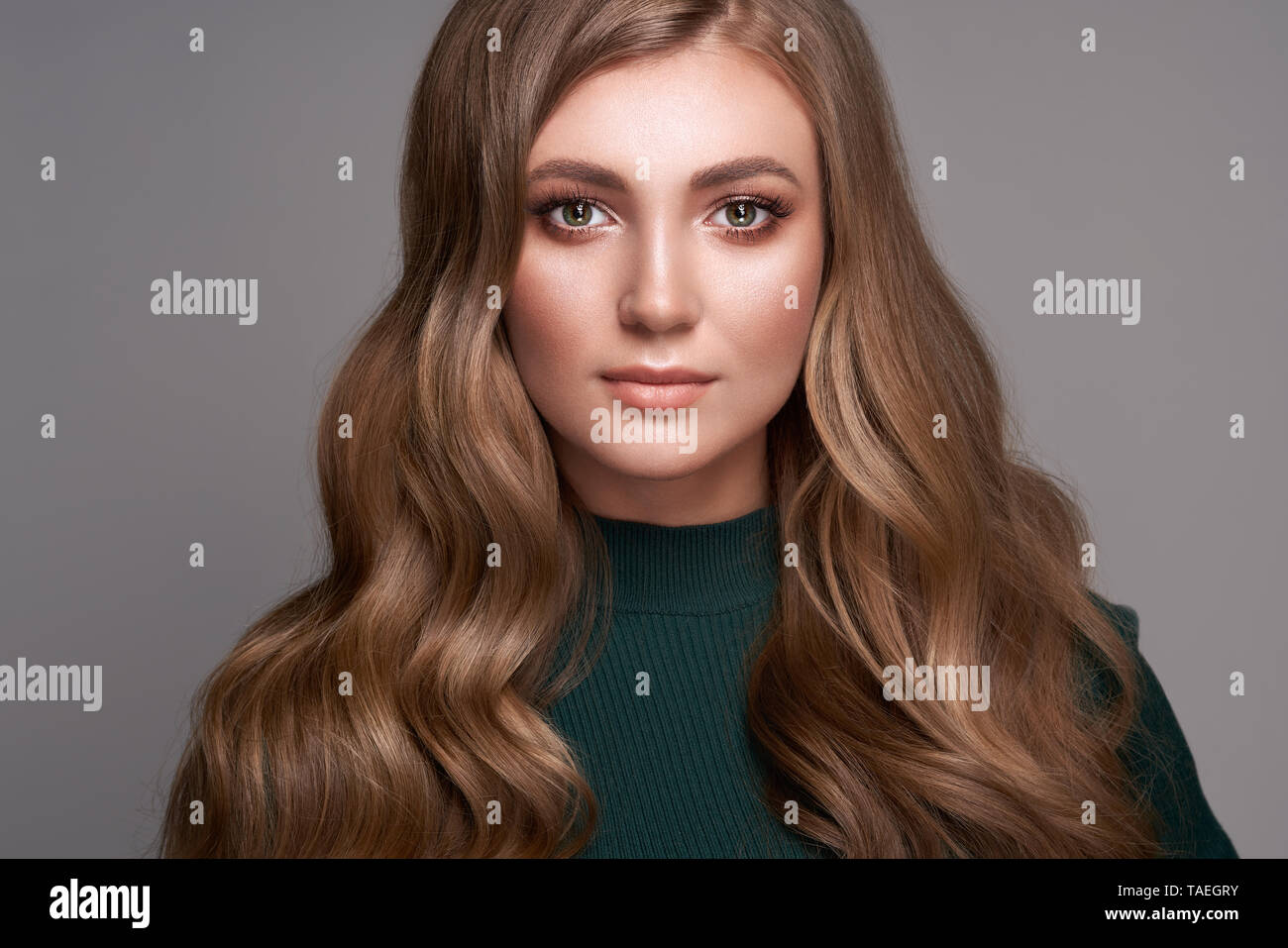 Brunette Girl With Long Healthy And Shiny Curly Hair Care And