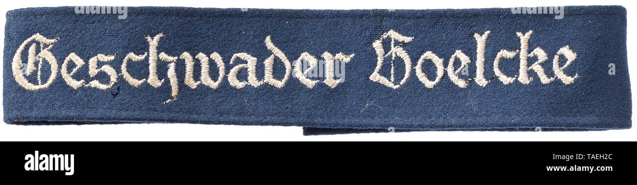 A cuff title 'Geschwader Boelcke' for enlisted men/NCOs Blaues Band aus feinem Abzeichentuch mit weiß gestickter, gotischer Aufschrift. Länge 39 cm. Mottenspuren. 1936 in Hannover als Kampfgeschwader 154 'Boelcke' aufgestellt, am 1.4.37 in Kampfgeschwader 157 'Boelcke', am 1.5.39 in Kampfgeschwader 27 'Boelcke' und am 13.11.44 in Kampfgeschwader (J) 'Boelcke' umbenannt. historic, historical, Air Force, branch of service, branches of service, armed service, armed services, military, militaria, air forces, object, objects, stills, clipping, clippings, cut out, cut-out, cut-ou, Editorial-Use-Only Stock Photo
