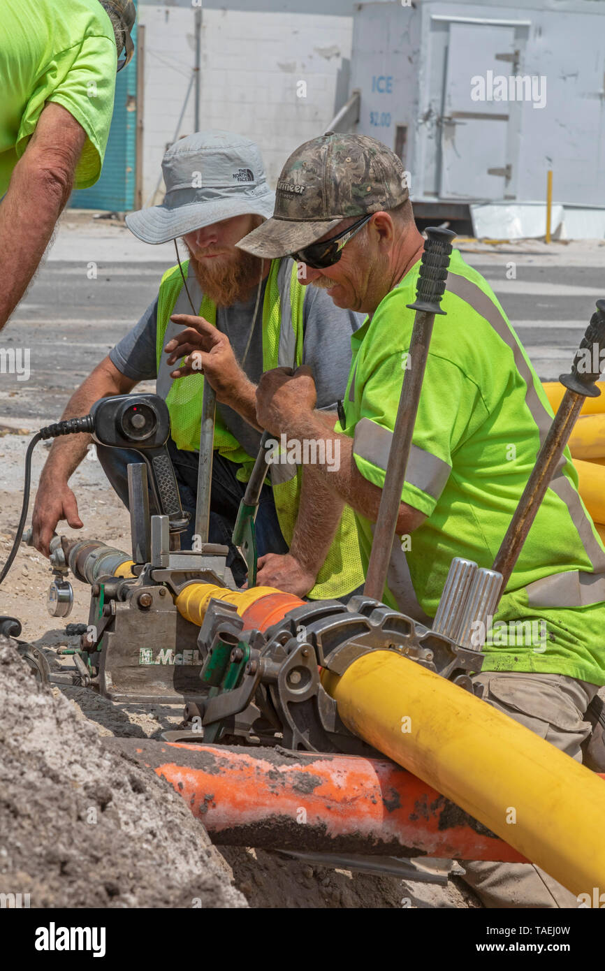 Mexico Beach, Florida Workers replace a natural gas line seven months