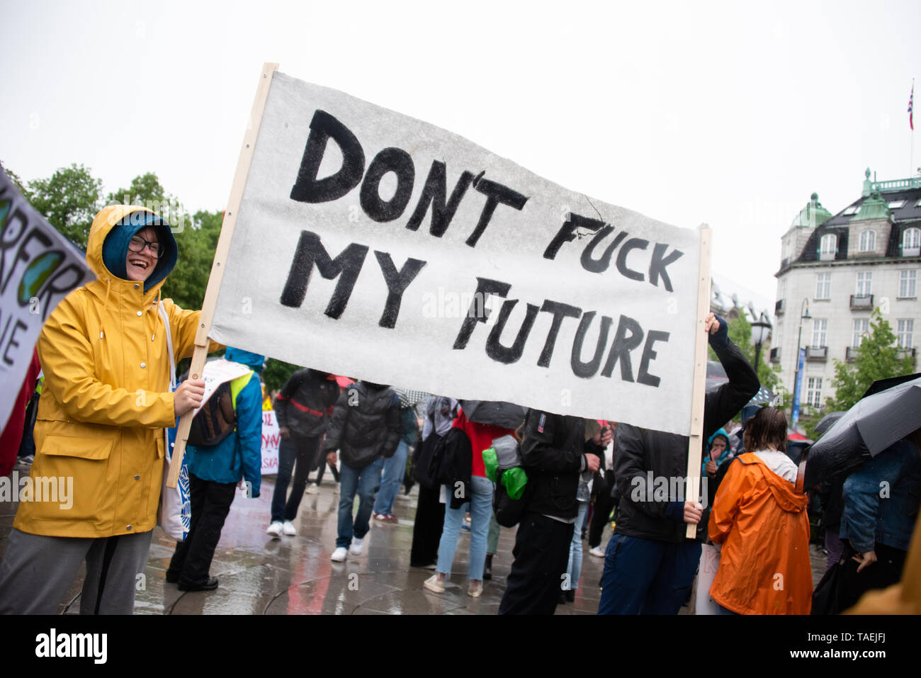 OSLO - MAY 24, 2019: Students carry a sign reading 'Don't Fuck My Future' as thousands march in the School Strike for the Climate in Oslo, Norway, May 24, 2019. Stock Photo