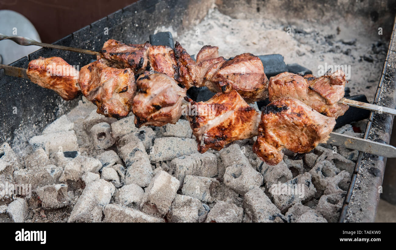 The meat is on charcoal closeup outdoors. Street food. Barbecue season Stock Photo Alamy
