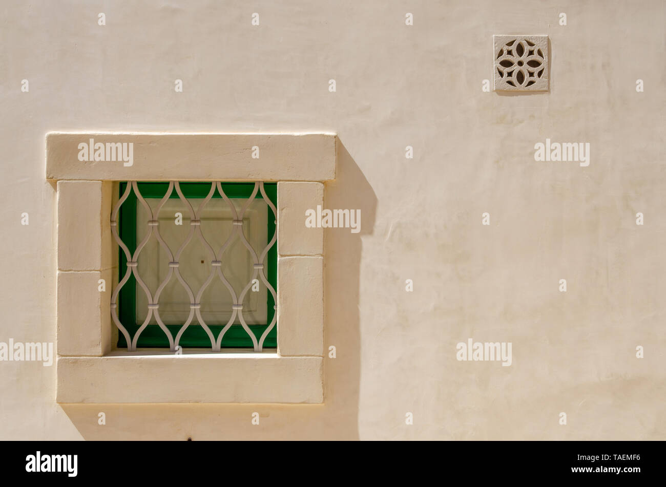 The ancient window on stone wall, for background Stock Photo - Alamy