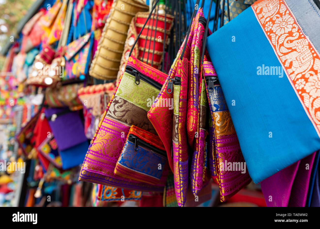 Horizontal close up of handmade silk bags in India. Stock Photo