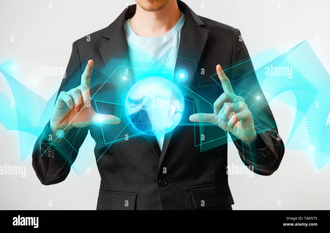Businessman holding the glowing hologram digital globe. Concepr of ...