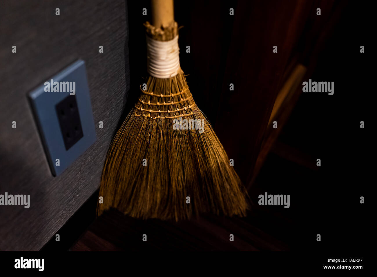 Traditional japanese house or ryokan with closeup of small broom at