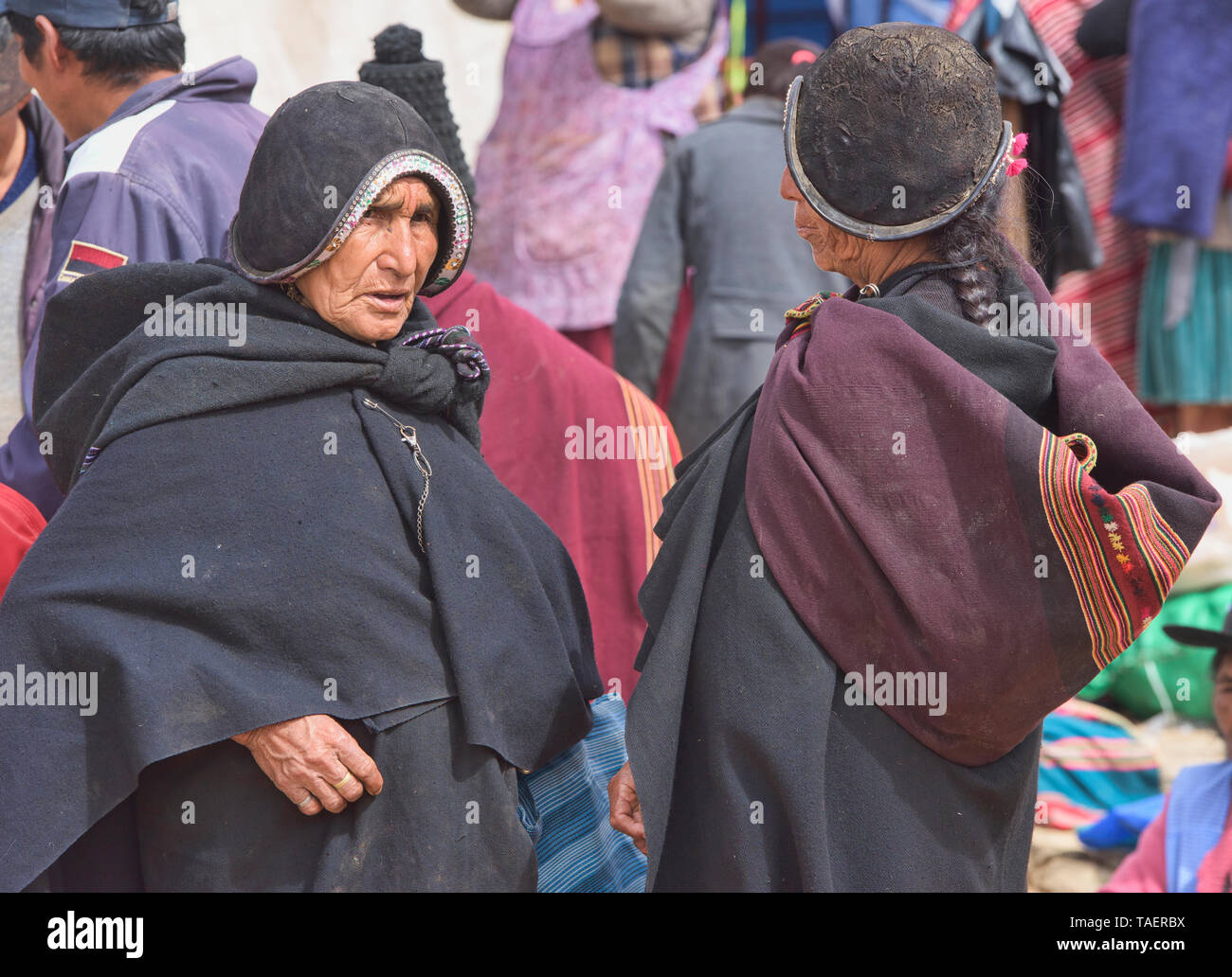 Traditional Yampara women with leather hats, Tarabuco, Bolivia Stock