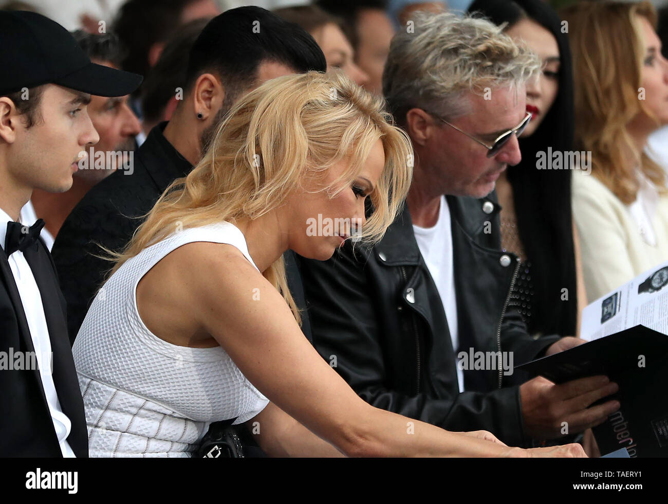 Pamela Anderson (left) and Eddie Irvine attending the Amber Lounge Fashion Show 2019, held in Monaco, France. Stock Photo