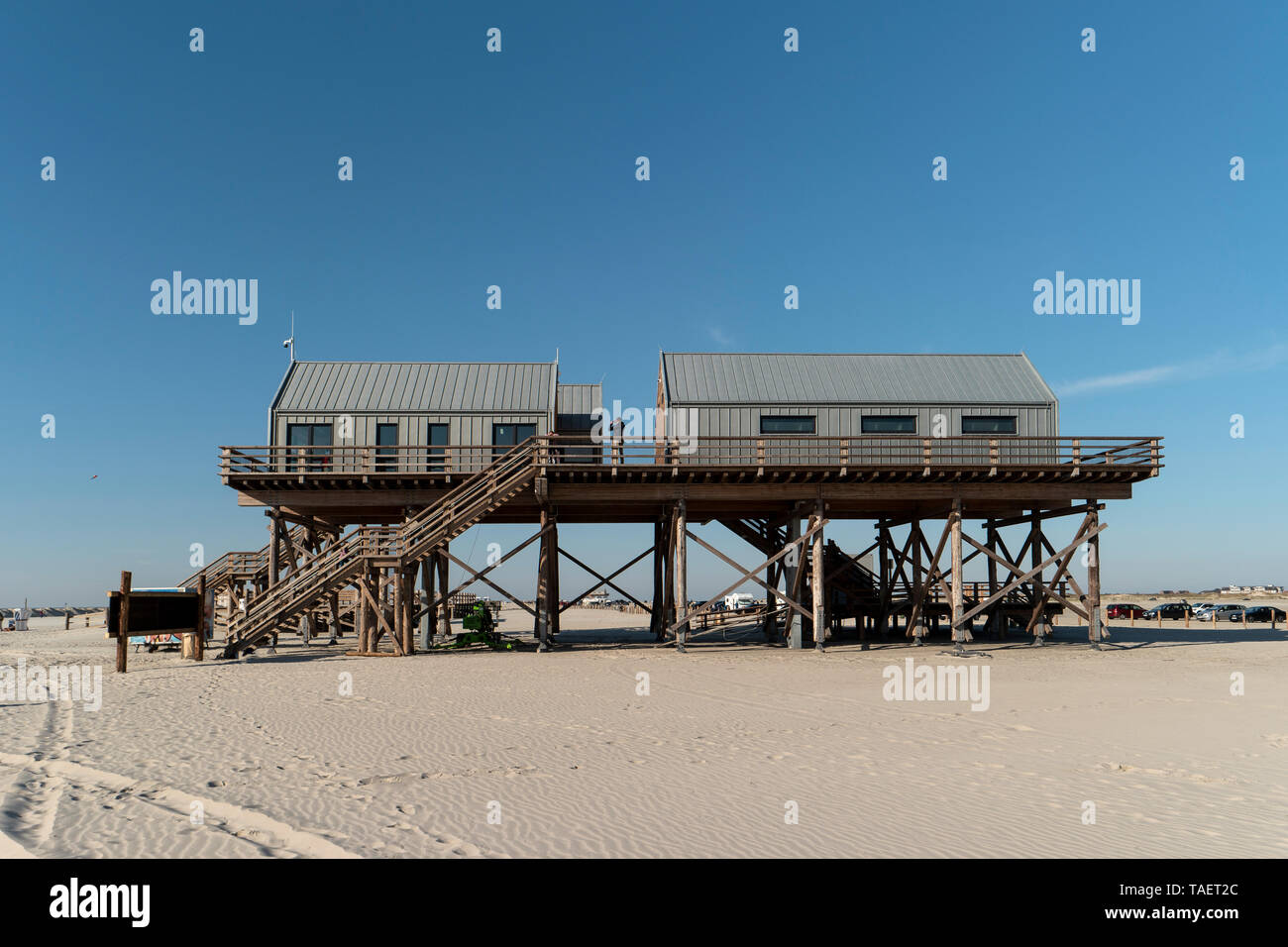 Stilt house on the beach of st peter ording hires stock photography