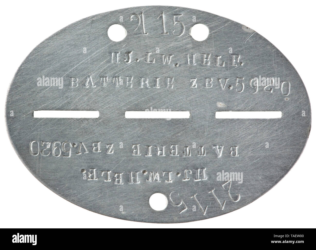 An identification tag of a Hilter Youth Luftwaffe auxiliary Aluminium mit vs. Bezeichnung '2115 - HJ.Lw. Helf. Batterie zbV. 5920', rs. ohne Markung. historic, historical, Air Force, branch of service, branches of service, armed service, armed services, military, militaria, air forces, object, objects, stills, clipping, clippings, cut out, cut-out, cut-outs, 20th century, Editorial-Use-Only Stock Photo