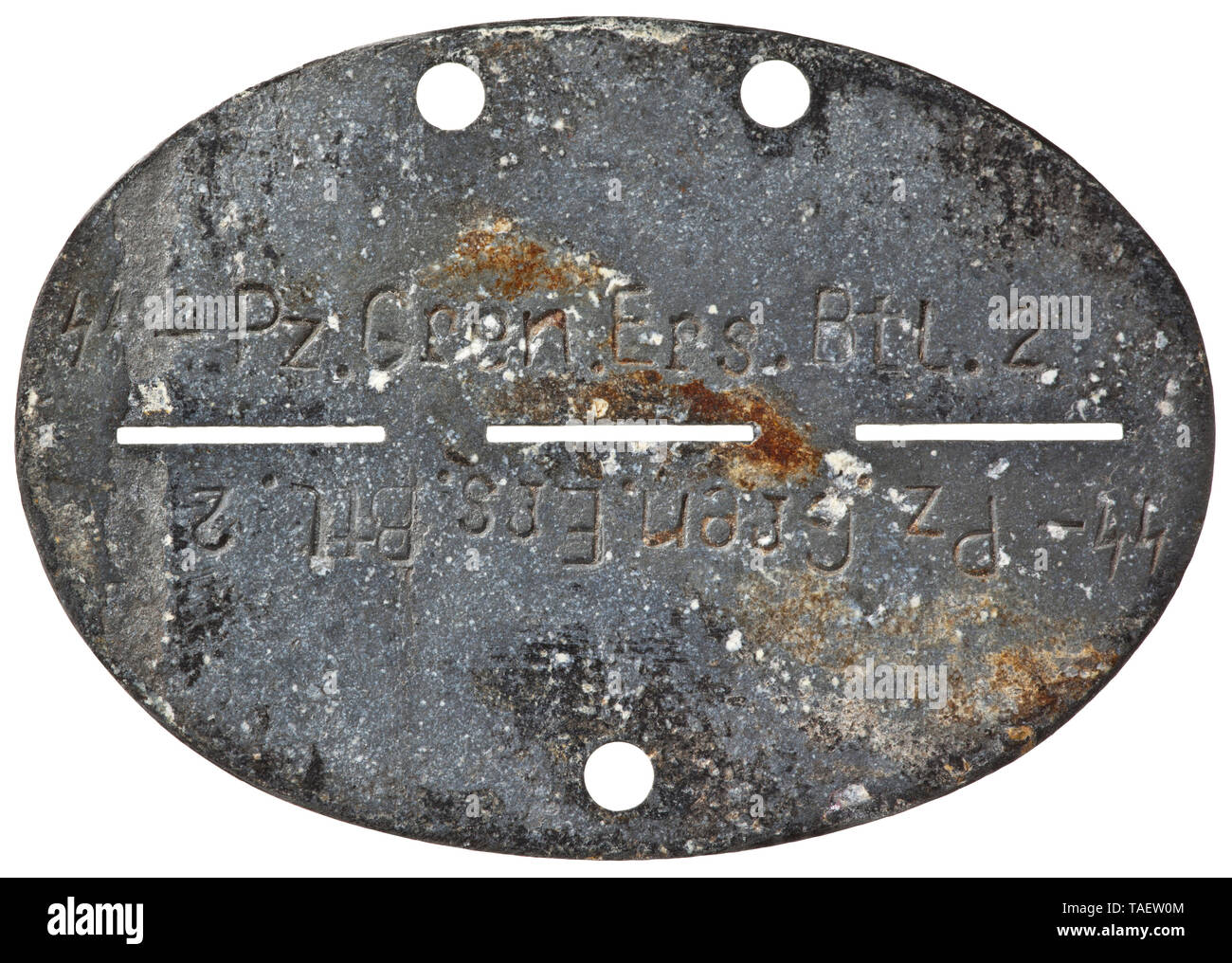 An identification tag, SS Panzer Grenadier Battalion 2 Feinzink (migriert) mit vs. Bezeichnung 'SS-Pz.Gren.Ers.Btl. 2', rs. ohne Markung. historic, historical, 20th century, 1930s, 1940s, Waffen-SS, armed division of the SS, armed service, armed services, NS, National Socialism, Nazism, Third Reich, German Reich, Germany, military, militaria, utensil, piece of equipment, utensils, object, objects, stills, clipping, clippings, cut out, cut-out, cut-outs, fascism, fascistic, National Socialist, Nazi, Nazi period, Editorial-Use-Only Stock Photo