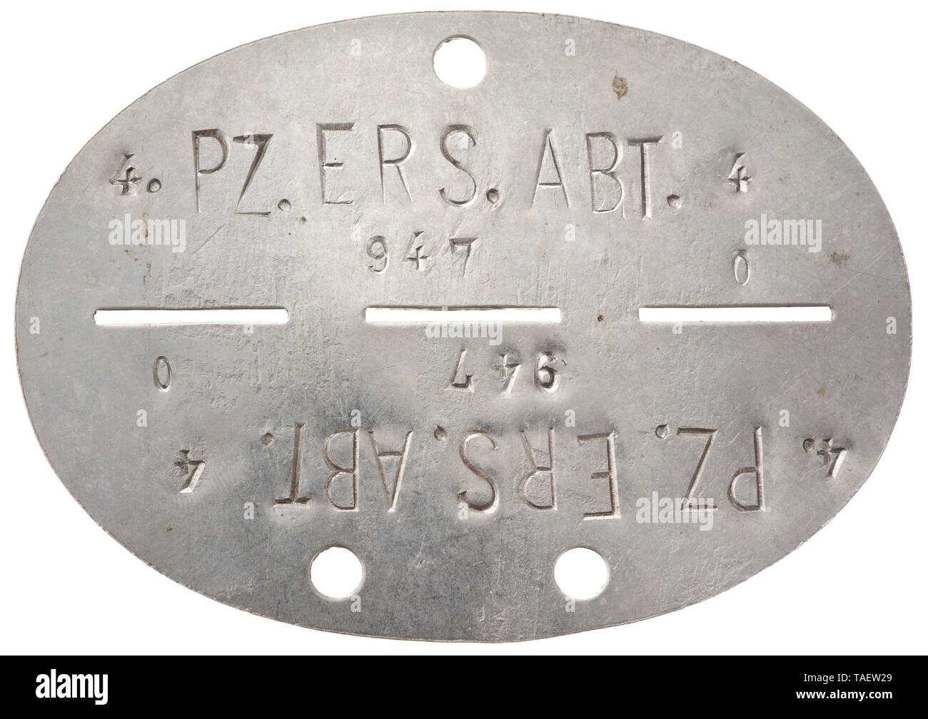 An identification tag of Panzer Replacement Battalion 4 Eisenblech mit vs. Bezeichnung '4. Pz. Ers. Abt. 4 - 947 0', rs. ohne Markung. historic, historical, 20th century, Editorial-Use-Only Stock Photo