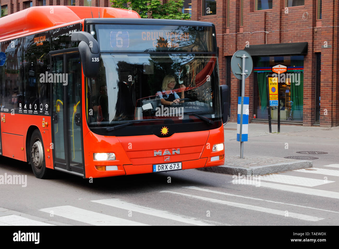 Karlstad, Sweden - May 21, 2019: Front view of an orange city bus in service on line 6 operated by the public transportation comnpany Karlstadsbuss. Stock Photo