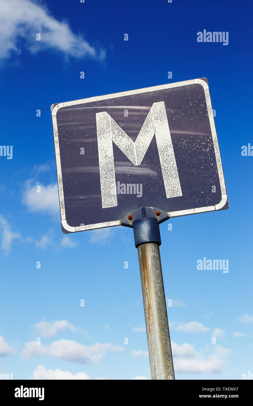 Weathered Swedish road sign on narrow roads indicates a layby or a passing place. Stock Photo