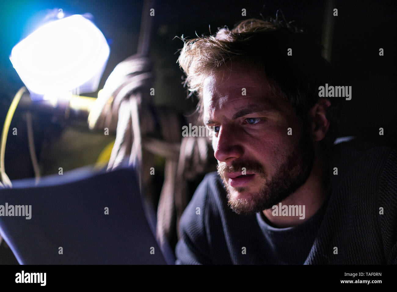 Portrait of actor at theatre studying script backstage Stock Photo