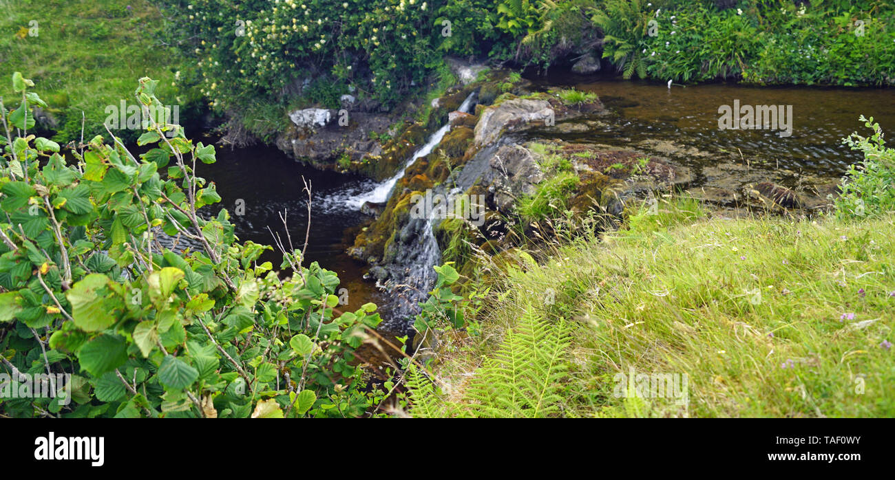 small waterfall in Scotland. Scotland is full of beautiful landscapes where ever you look. The beauty of nature is hard to put into words. Stock Photo