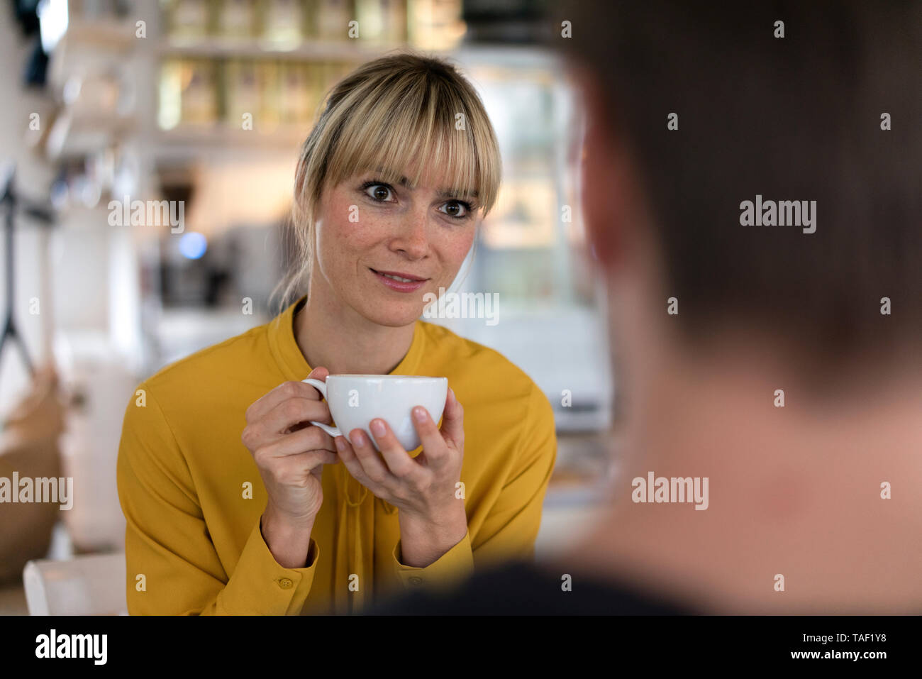Colleagues having a break, talking and drinking coffee Stock Photo