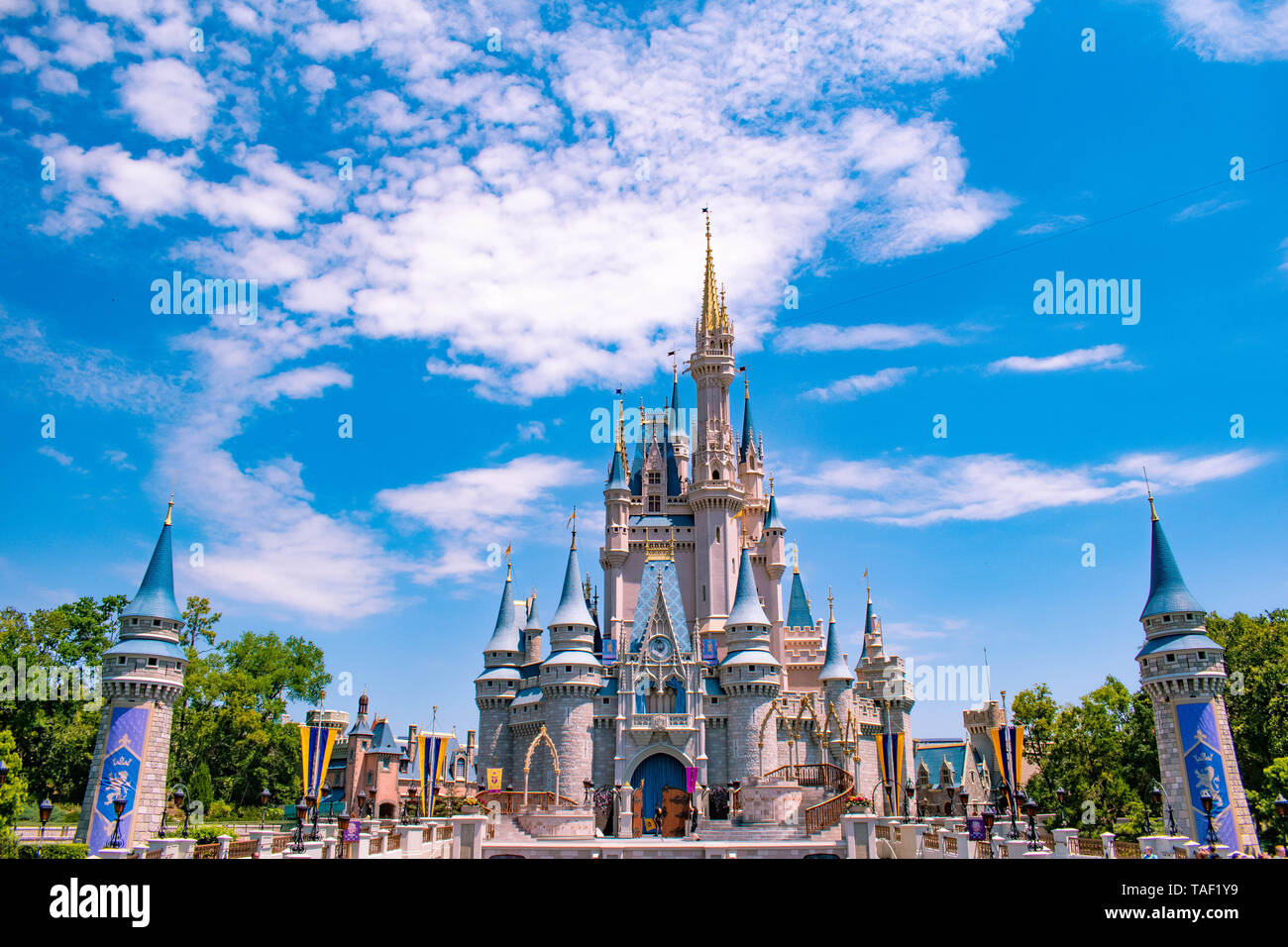 Orlando, Florida. May 17, 2019. Panoramic view of Cinderella's Castle on cloudy lightblue sky background  in Magic Kingdom at Walt Disney World Resort Stock Photo