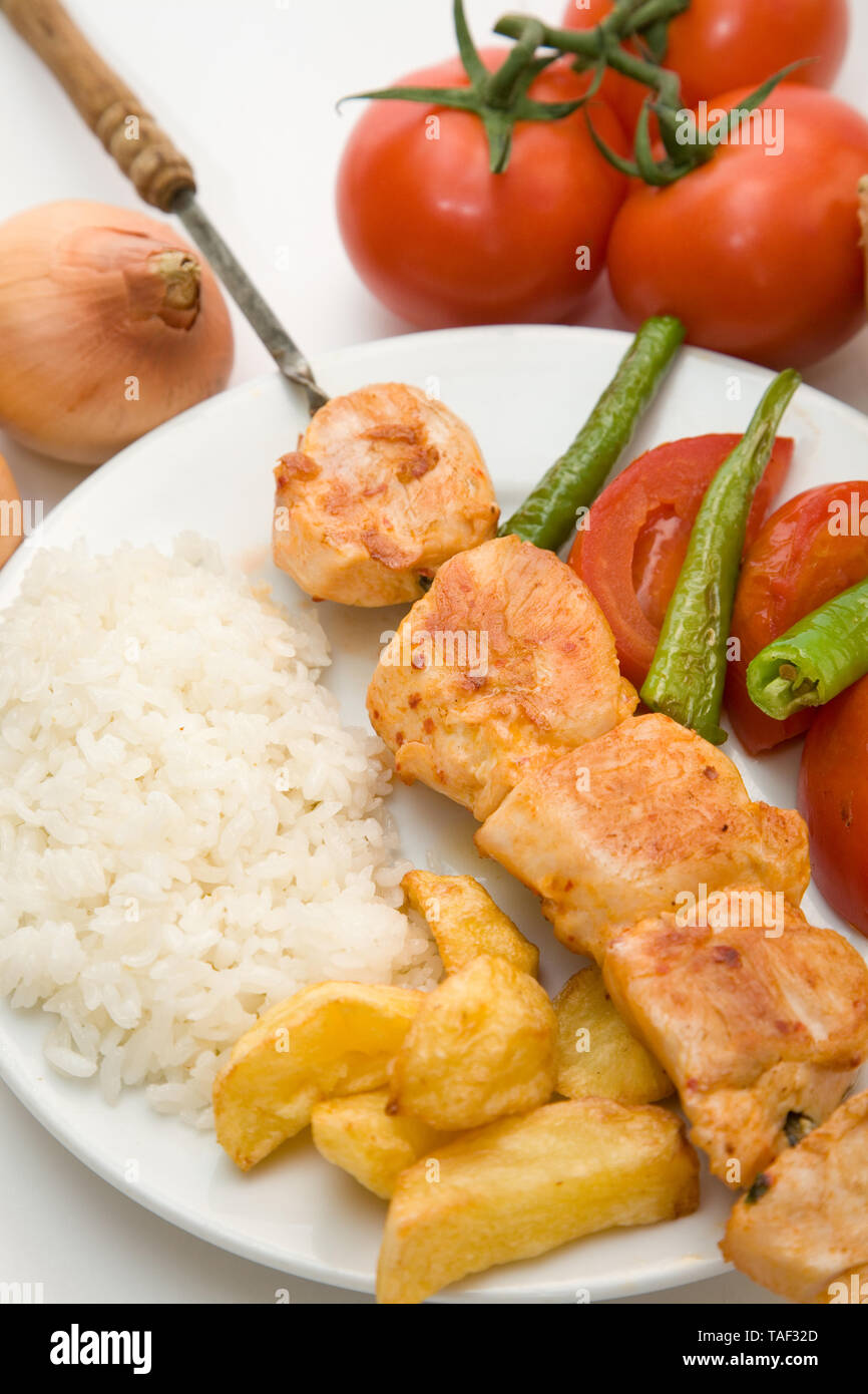 turkish style chicken fillet kebab with rice and salads Stock Photo Alamy