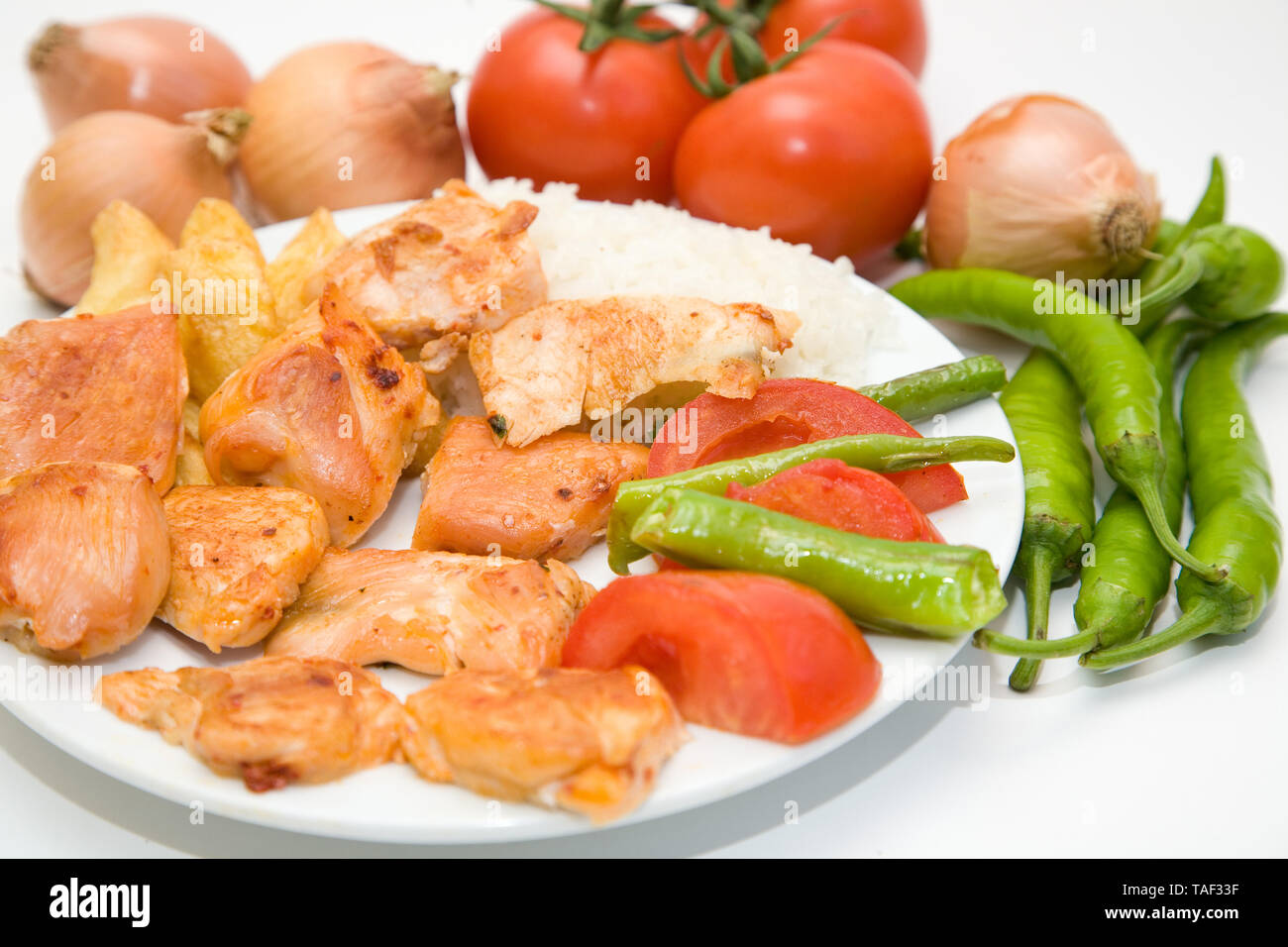 turkish style chicken fillet kebab with rice and salads Stock Photo Alamy