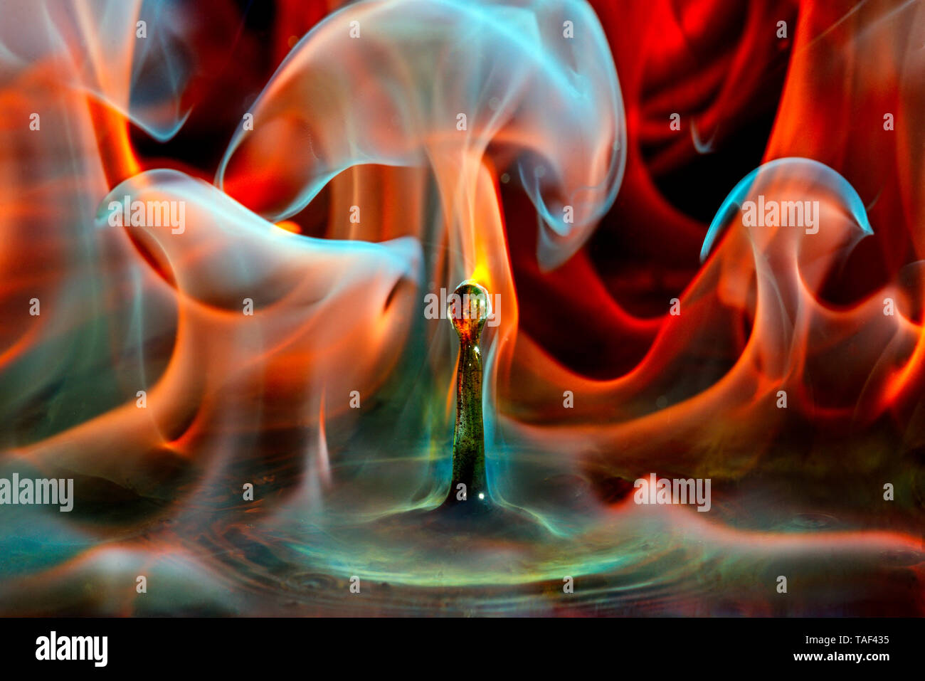 Burning drop, drop of water into benzine Stock Photo - Alamy