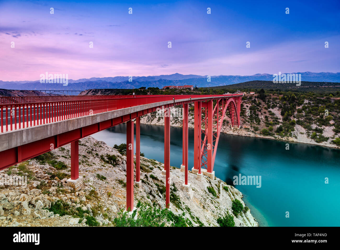 Colorful evening view of Maslenica bridge In Dalmatia, Croatia. Wide angle, long exposure and color grad filters used. Stock Photo