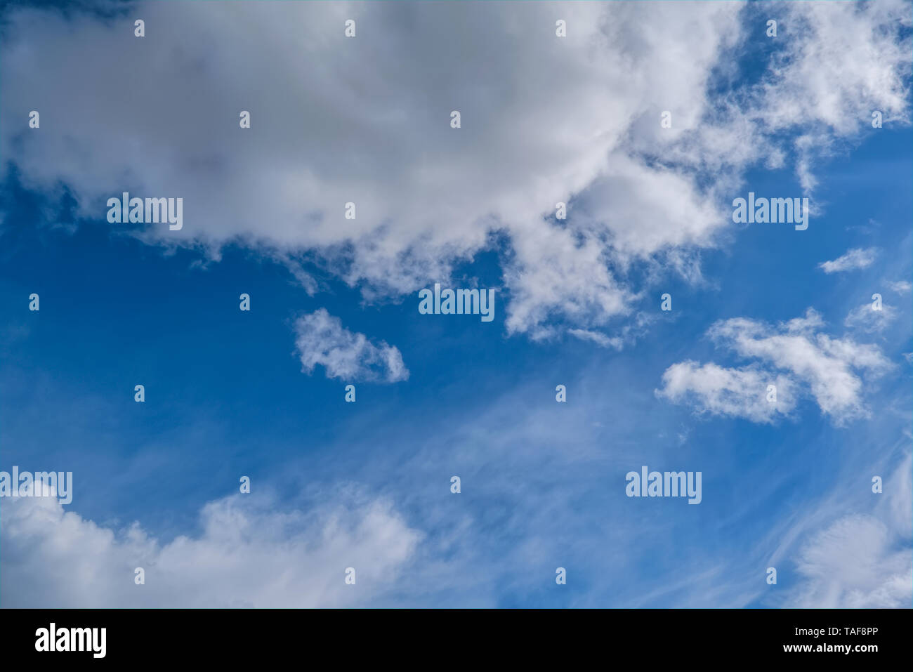 Blue summer sky white cumulus clouds background Stock Photo - Alamy