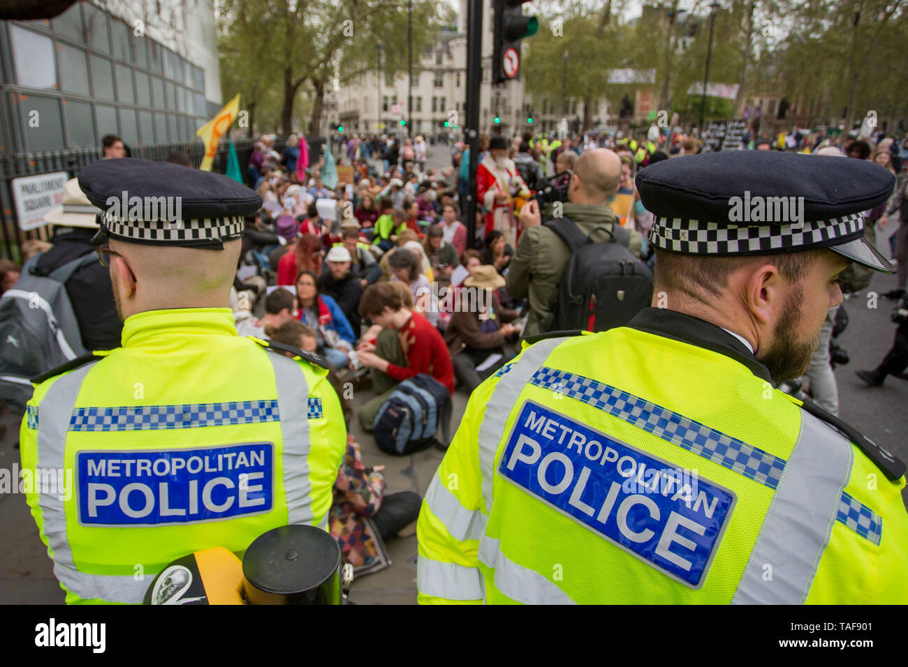 Campaigners from climate protest group Extinction Rebellion write letters to their Members of Parliament on Parliament Square. Various MPs and Jenny Jones, Baroness Jones of Moulsecoomb, assisted in delivering the letters as the group were barred access to Parliament by a police cordon.  Featuring: Atmosphere, View Where: London, United Kingdom When: 23 Apr 2019 Credit: Wheatley/WENN Stock Photo