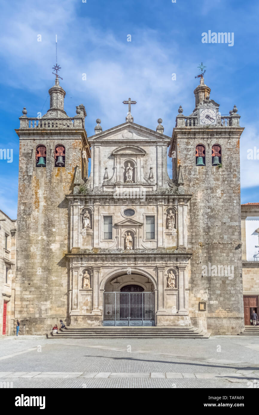 Viseu / Portugal - 04 16 2019 : View at the front facade of the Cathedral of Viseu, Adro da Sé Cathedral de Viseu, architectural icon of the city of V Stock Photo