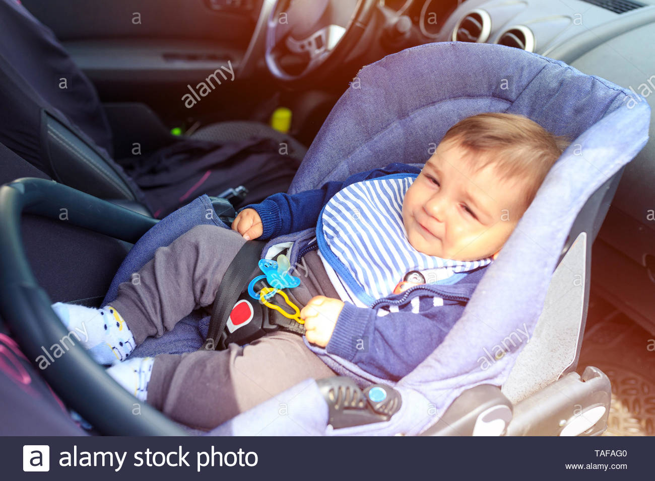 child sitting car