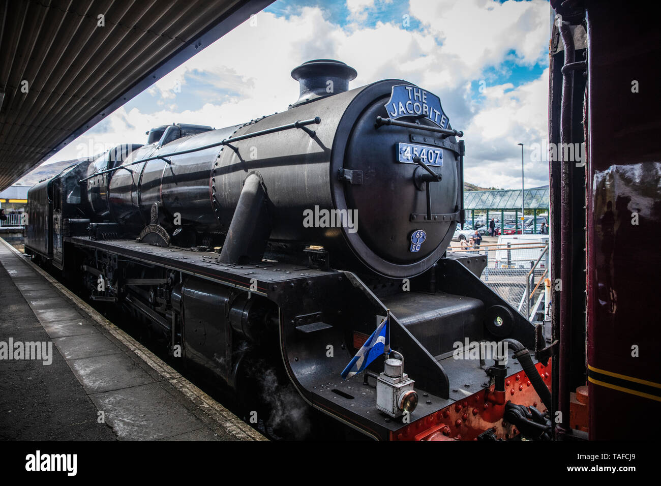 Jacobite Steam Train on platform at station Stock Photo