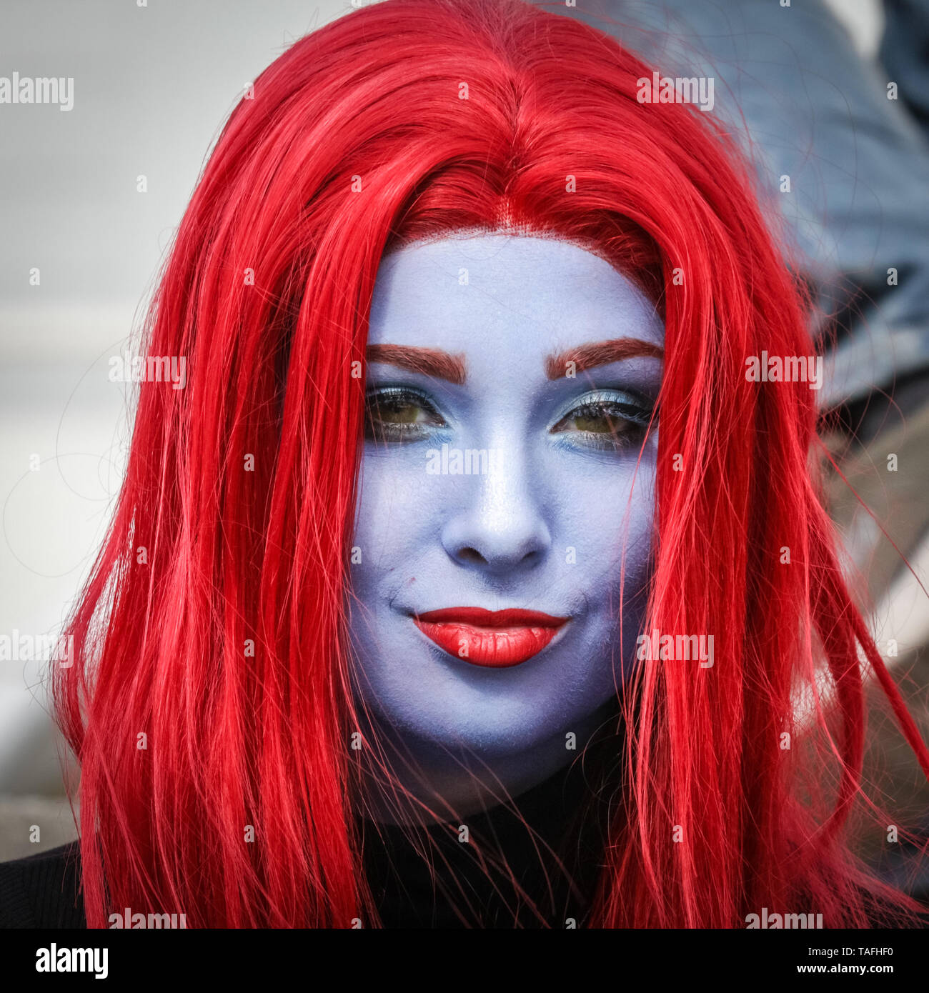 ExCel London, UK - 24th May 2019. Mystique from X-Men has gone all blue in the face. Thousands of cosplayers, gamers and lovers of film and TV fantasy and sci fi in costumes come together on the opening day of MCM Comicon at ExCel London. Credit: Imageplotter/Alamy Live News Stock Photo