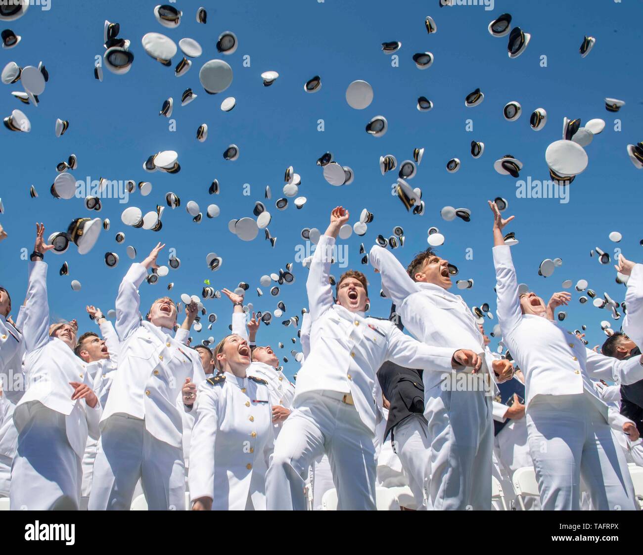 Annapolis, United States Of America. 24th May, 2019. U.S Naval Academy graduates toss their hats into the air following the 2019 graduation and commissioning ceremony in the Navy-Marine Corps Memorial Stadium May 24, 2019 in Annapolis, Maryland. Credit: Planetpix/Alamy Live News Stock Photo