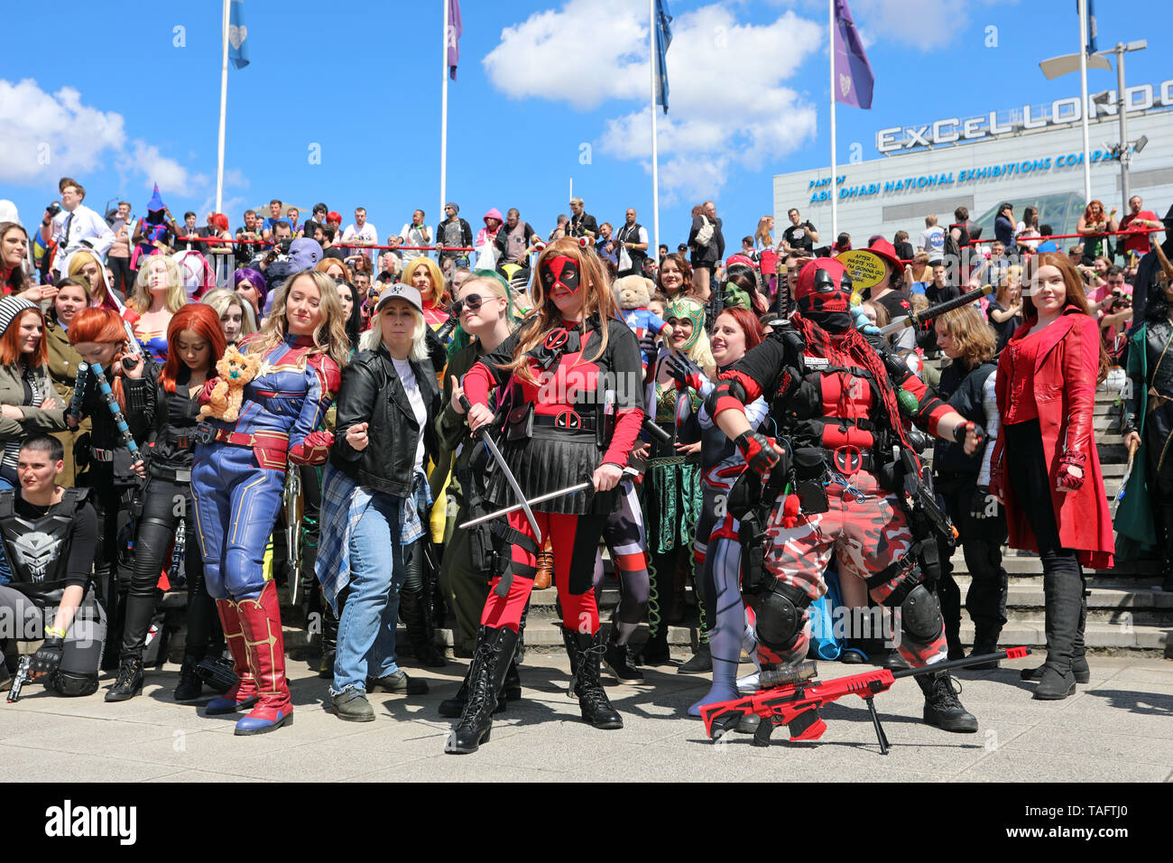 London, UK. 25th May 2019. The female heroes took the opportunity to get a group photo too when participants dressed as Avengers and Spider-Man dominated MCM London Comic Con at Excel in London this year and to celebrate so many coming together they arranged a special group photograph. Needless to say, Spider-Man stole the show and made sure he was in every photo! Credit: Paul Brown/Alamy Live News Stock Photo