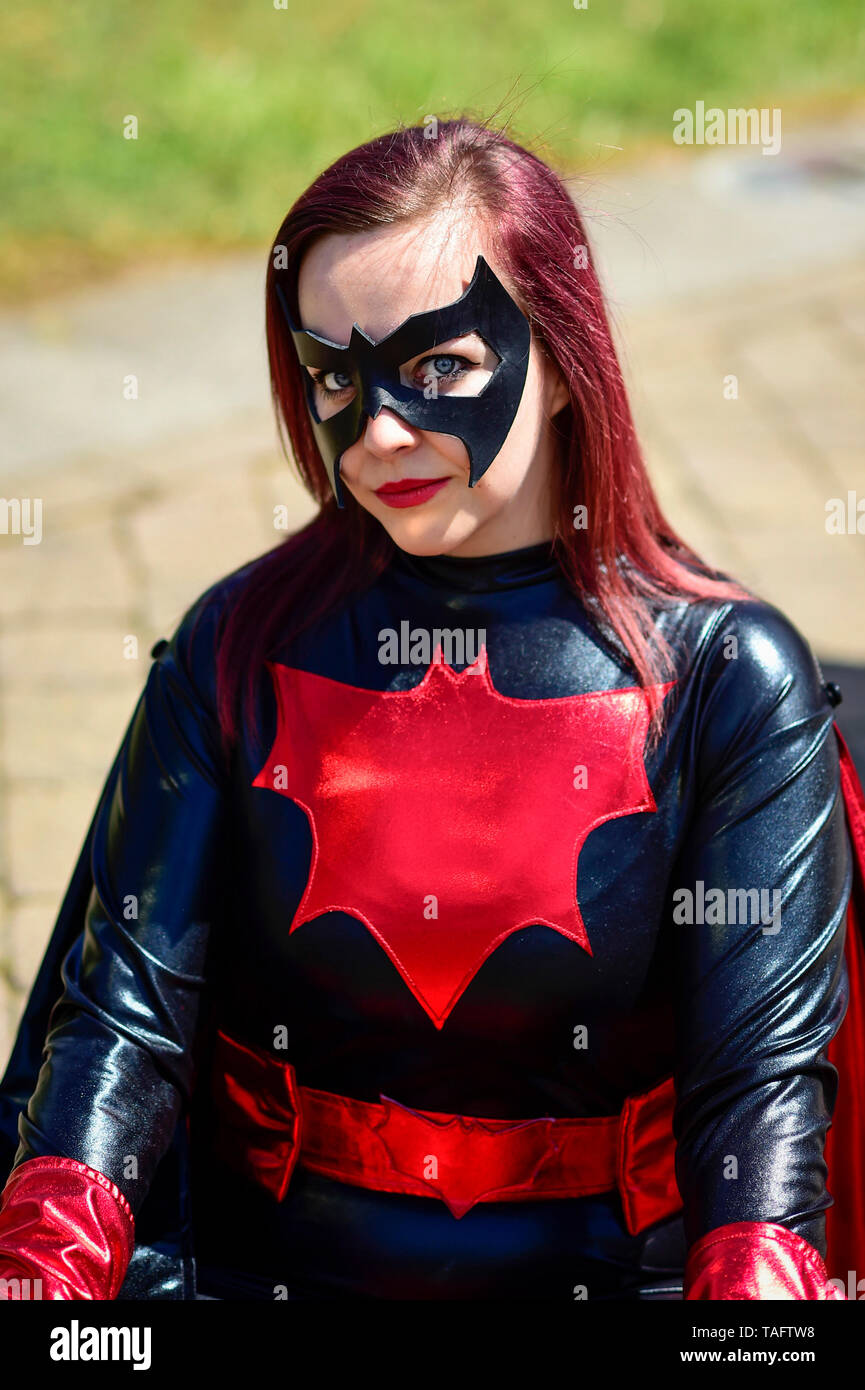 London, UK.  25 May 2019.  A cosplayer dressed as Batwoman attends day two of the bi-annual MCM Comic Con event at the Excel Centre in Docklands.  The event celebrates popular culture such as video, games, manga and anime providing many attendees with the opportunity to dress up as their favourite characters.  Credit: Stephen Chung / Alamy Live News Stock Photo
