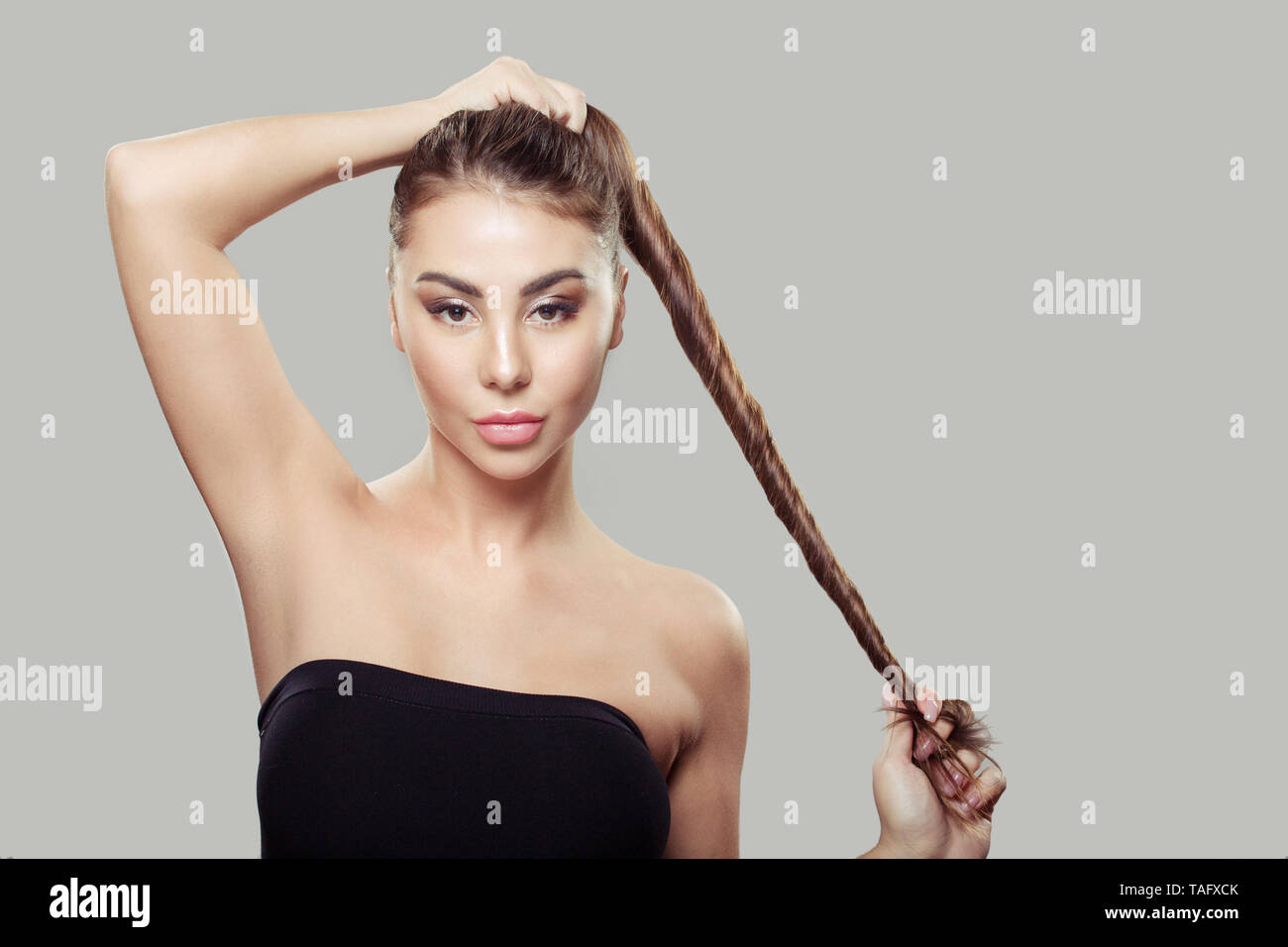 Woman long shiny hair hires stock photography and images Alamy