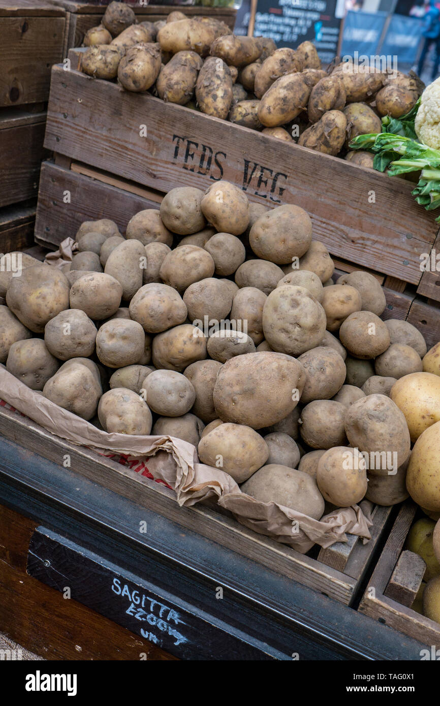 Borough Market rustic attractive home grown vegetable stall. British