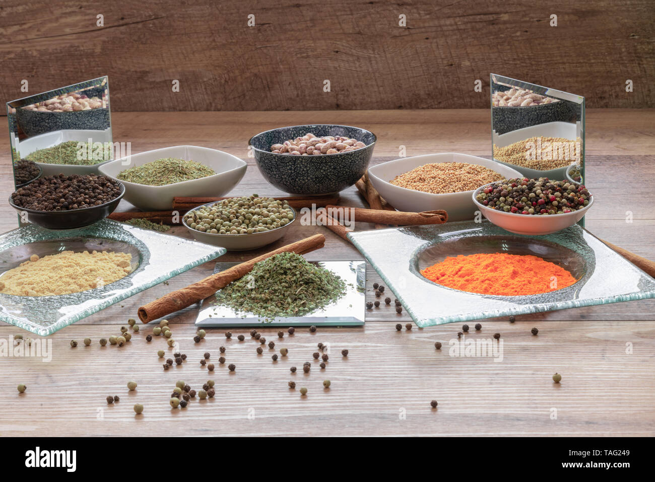 Set of glass trays with different spices in summer Stock Photo